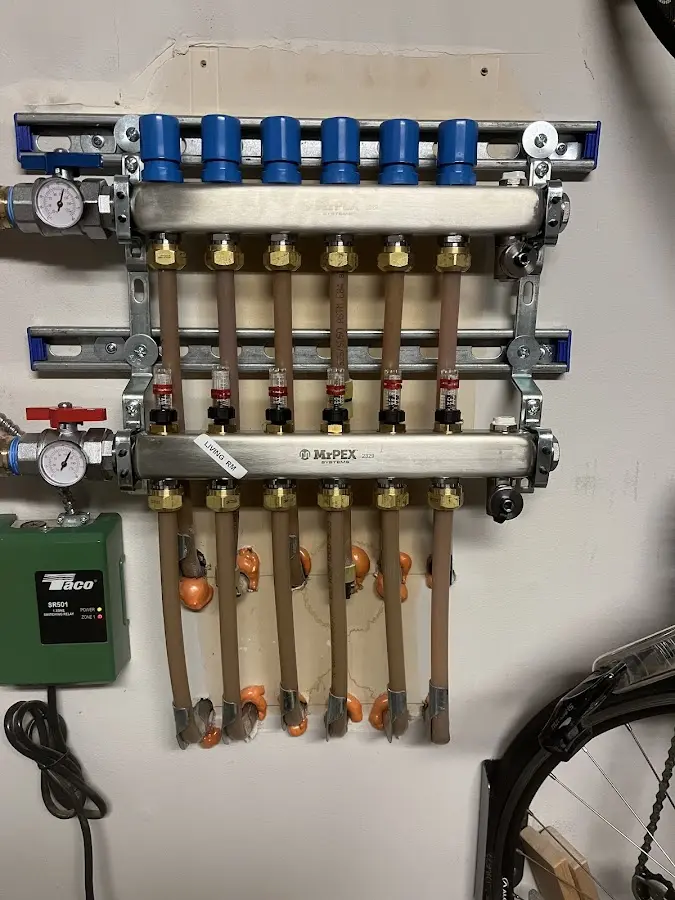 Plumber performing Gas Line Installation at a residential property in Warren